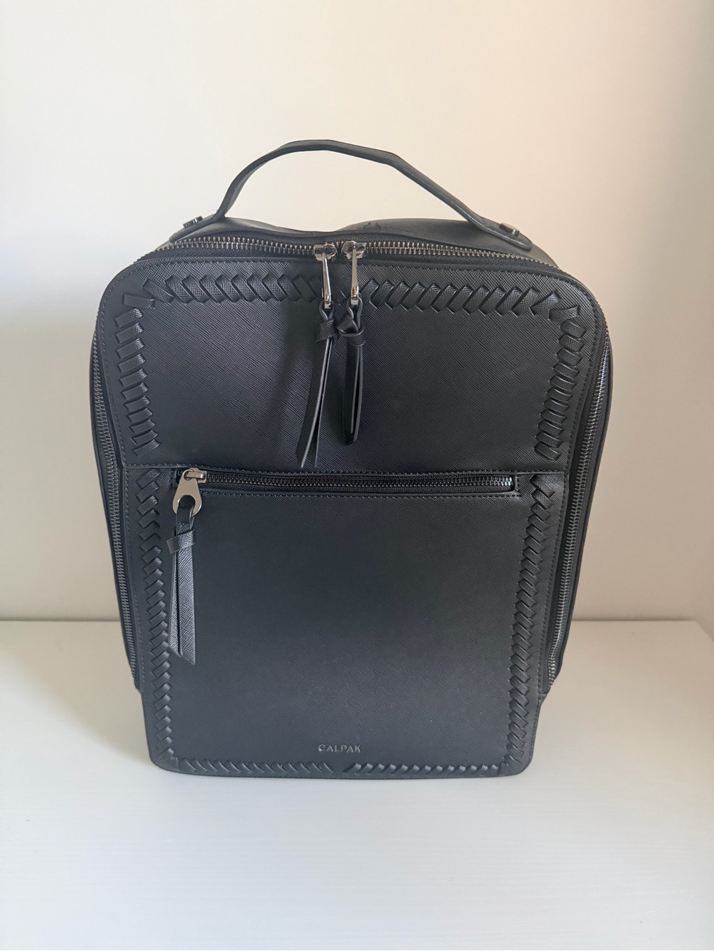 Calpak Black Leather Backpack with Woven Trim